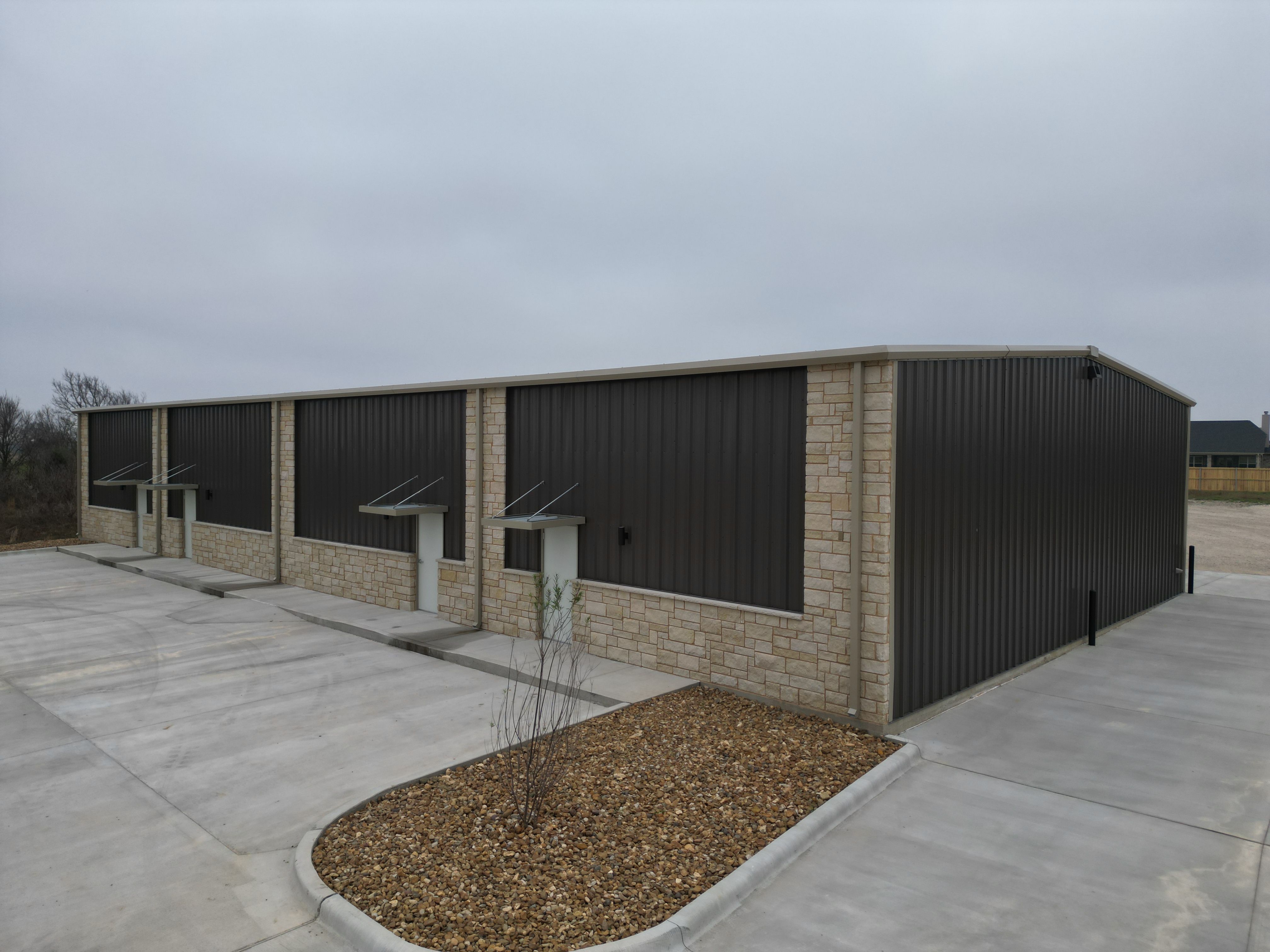 commercial metal building side view bryan tx multi unit layout